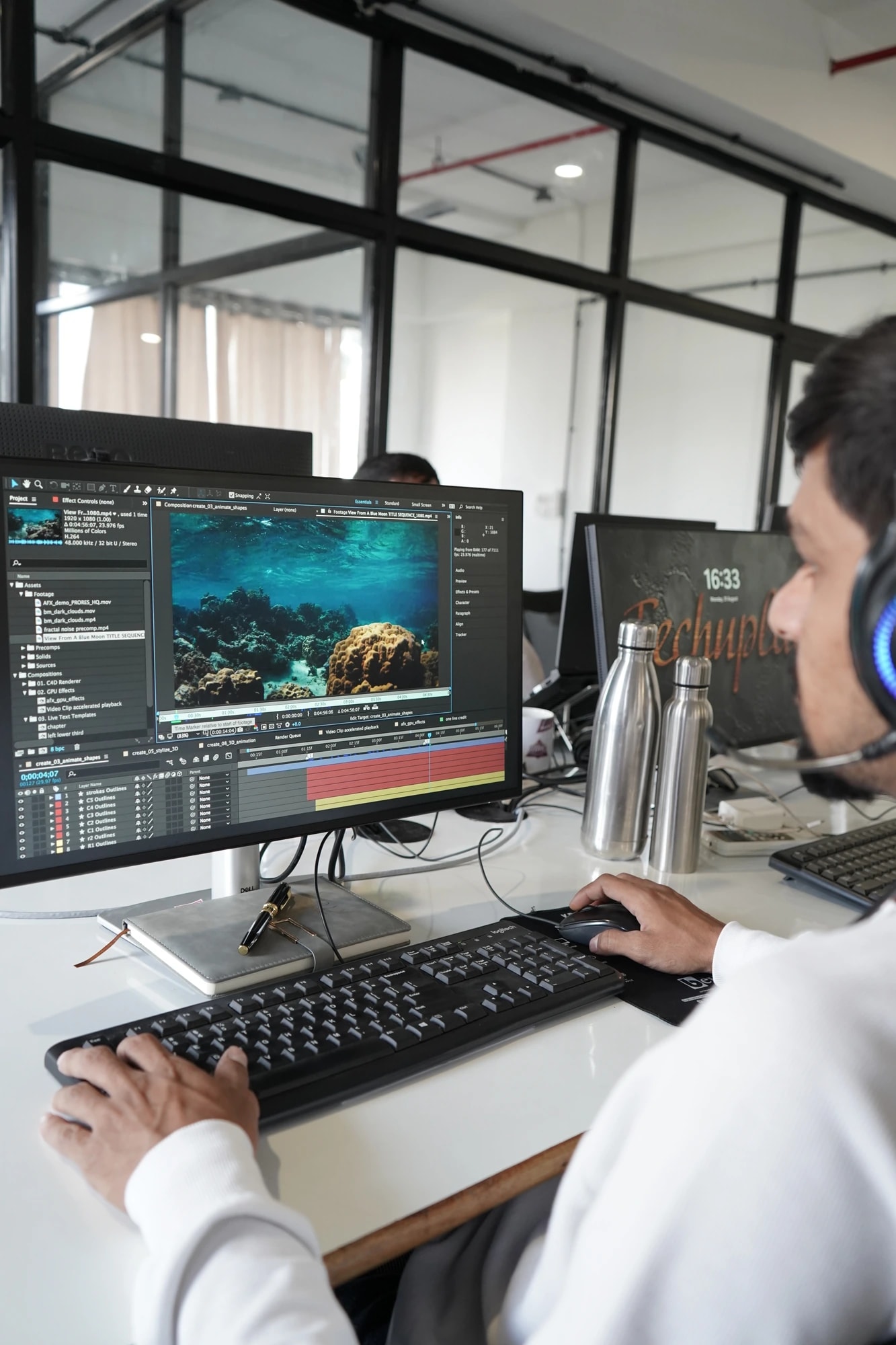 A Kalaa editor working on video footage at a workstation